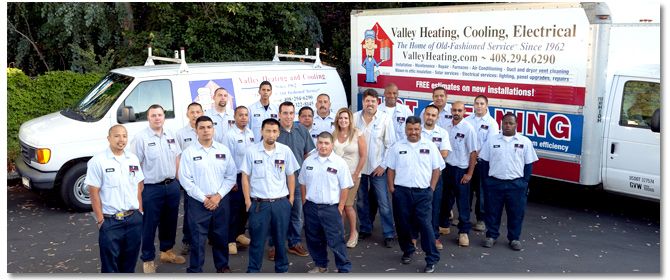 Valley Heating, Cooling, Electrical and Solar Team In Front of Vans 