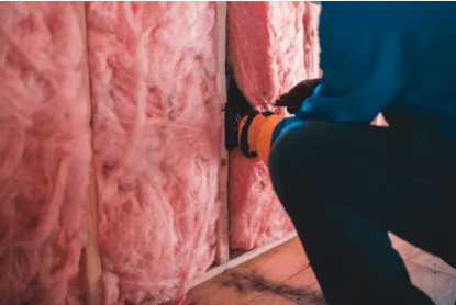 Person Installing Insulation