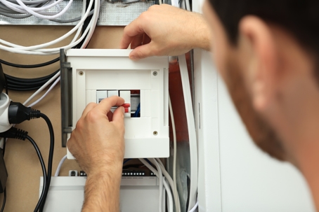 Man working with circuit board